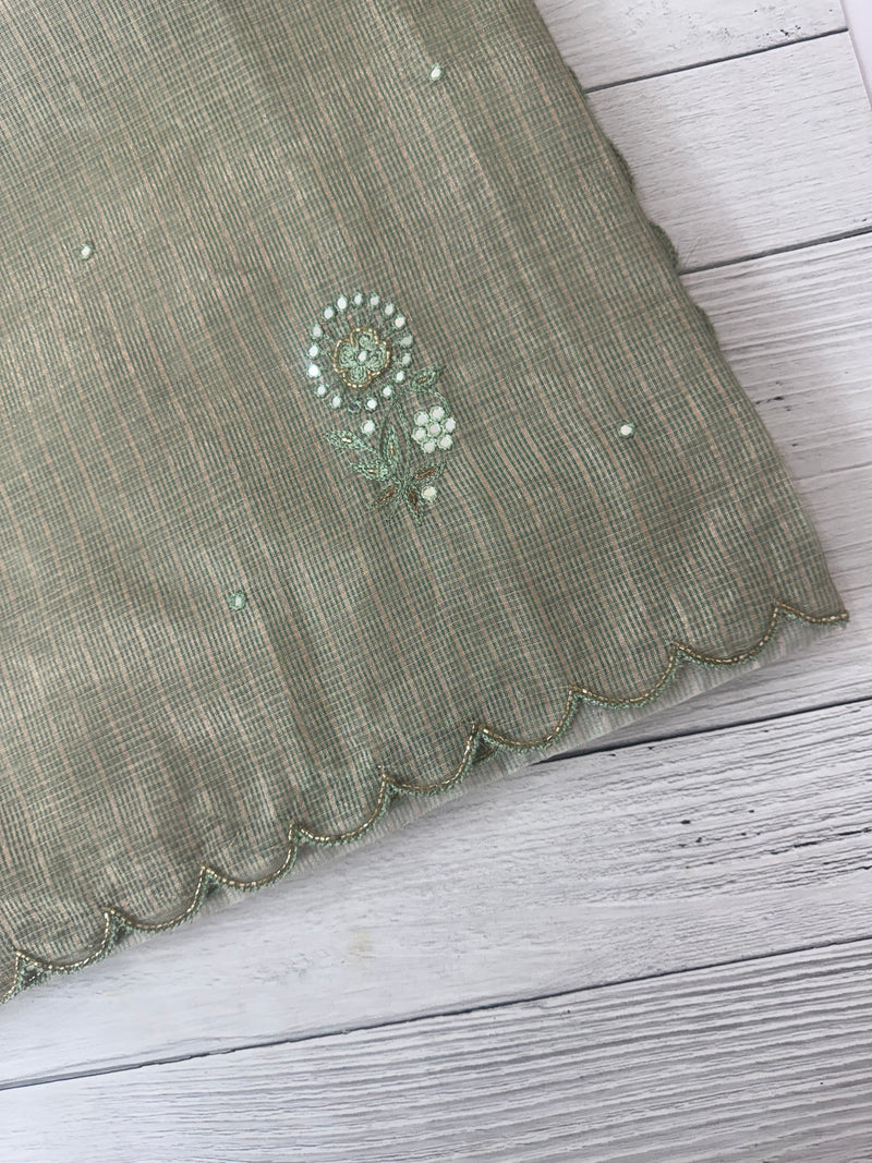 Tissue silk saree with foil work and cutdana scalloped border 
MTSS432 - DuskyGreen