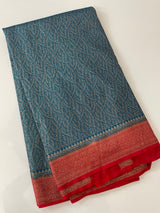 Banarasi semi katan saree with contrast border SHKNTNM- OceanaBlue to Red