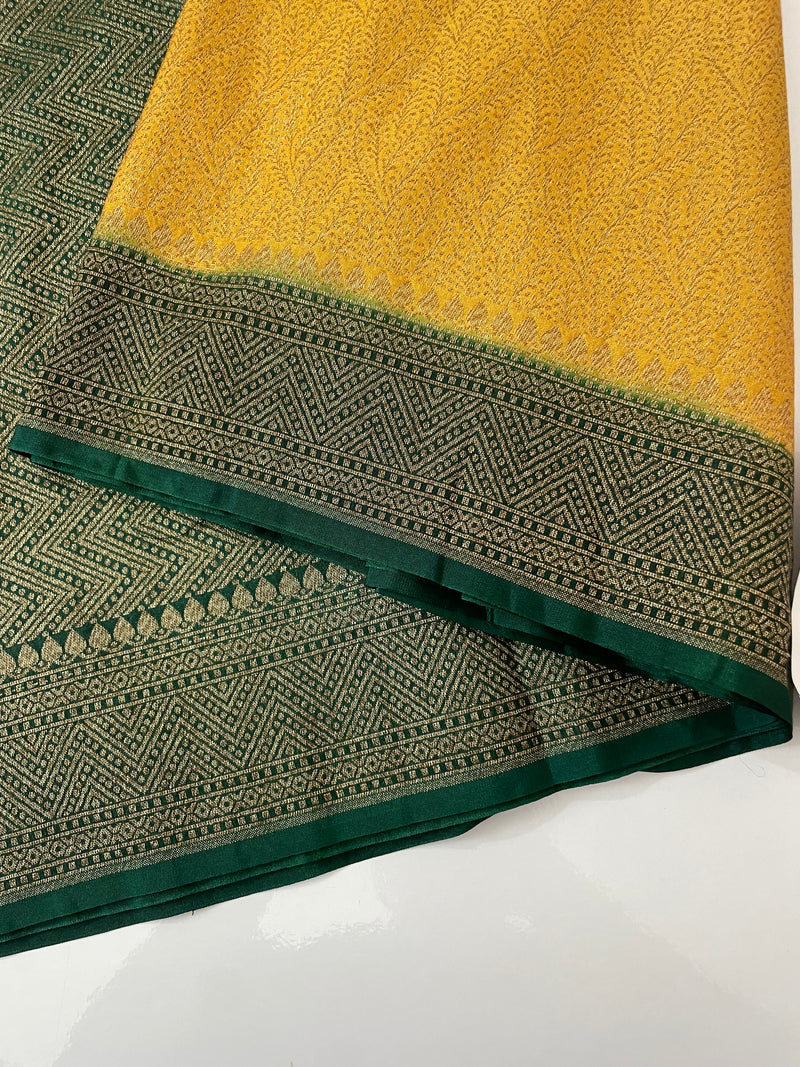 Banarasi semi katan saree with contrast border SHKNTNM- Creamy Yellow to BottleGreen