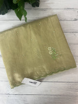 Tissue silk saree with foil work and cutdana scalloped border 
MTSS432- LightGreen