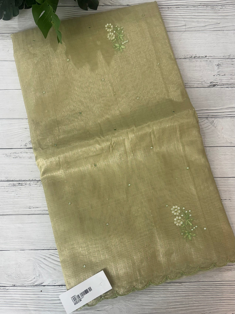 Tissue silk saree with foil work and cutdana scalloped border 
MTSS432- LightGreen
