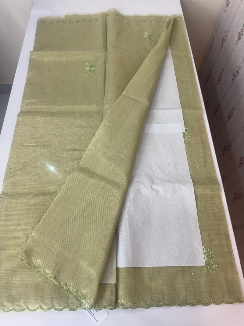 Tissue silk saree with foil work and cutdana scalloped border 
MTSS432- LightGreen