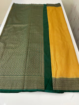 Banarasi semi katan saree with contrast border SHKNTNM- Creamy Yellow to BottleGreen