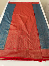 Banarasi semi katan saree with contrast border SHKNTNM- OceanaBlue to Red